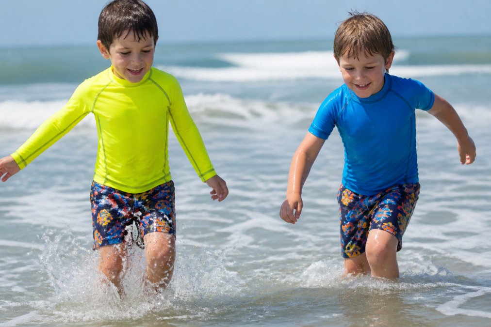 Side-by-side comparison of Two for long sleeve vs short sleeve swim sets