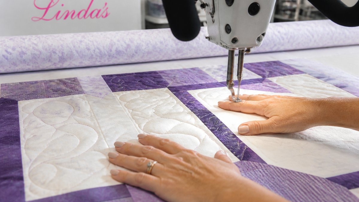 Diagram showing hand placement and needle position for free-motion quilting techniques