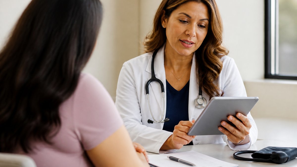 A physician in a modern telehealth setting reviewing a patient's health assessment on a tablet, with a stethoscope and clinical notes visible on a clean desk