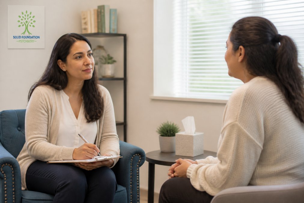 A compassionate healthcare professional listening attentively to a patient in a calm, welcoming office setting with soft lighting and comfortable seating
