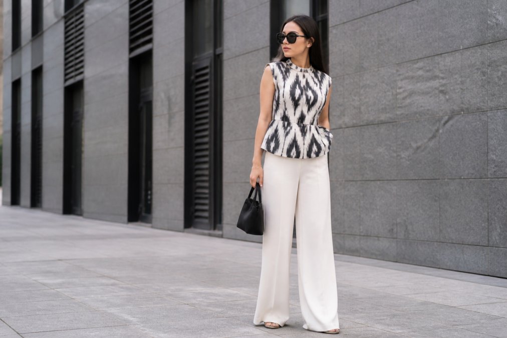 Infographic showing the styling process of ikat clothing brands with a woman wearing a monochrome patterned top.