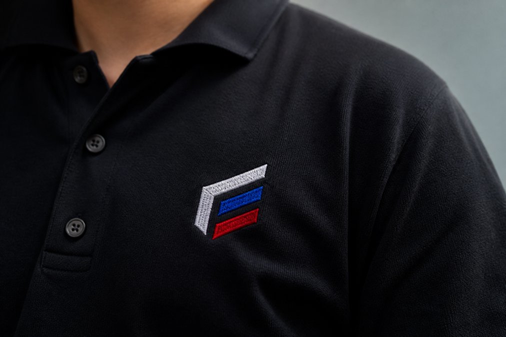 Infographic illustrating the multi-step process for high-quality, durable embroidery on workwear polo shirts