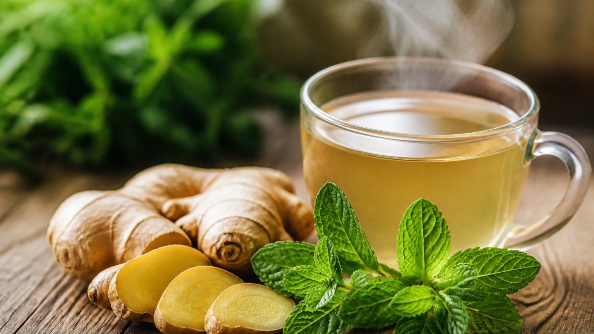 Infographic showing the process of using fresh ginger and peppermint tea to soothe occasional indigestion