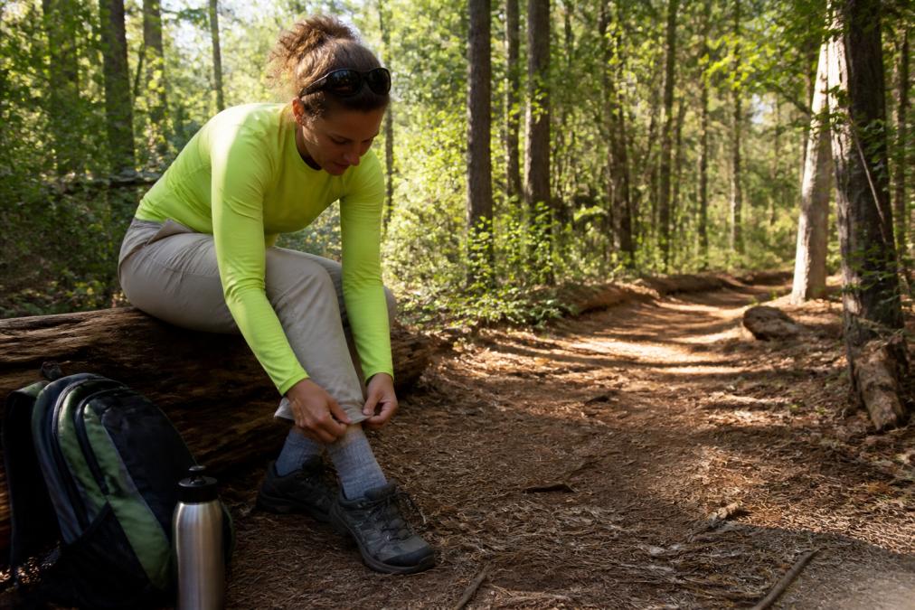 Expert tips illustration for pants and hiker and bright concepts for tick repellents