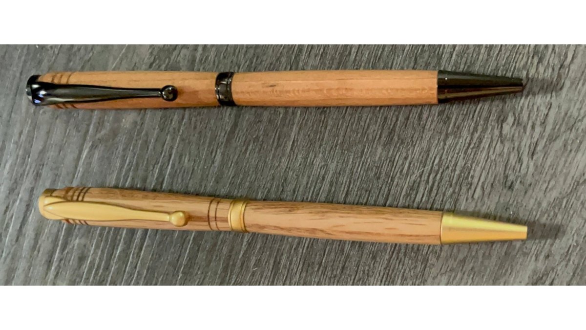 Two hand turned wooden pens