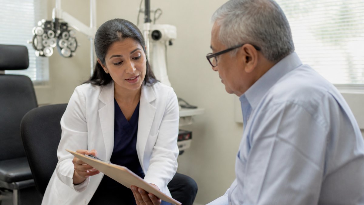 Professional demonstrating how to prepare for eye surgery with high blood pressure technique in modern clinical setting with natural lighting