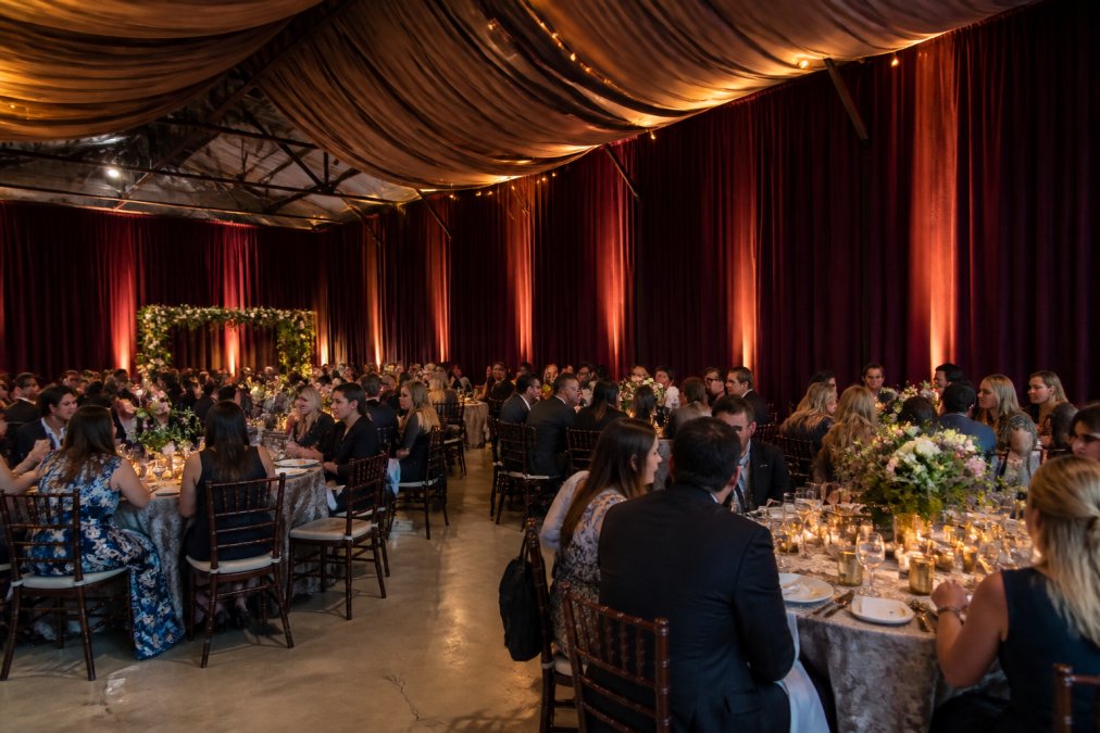 Professional illustration showing renting drapes for warehouse weddings