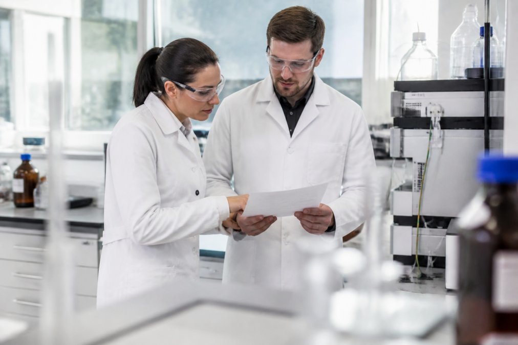 Scientist analysing research peptides for sale UK in a modern clinical laboratory setting