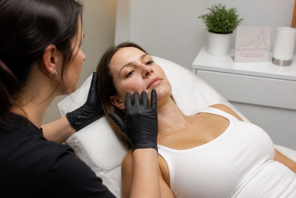 Close-up of healing skin during paramedical tattoo recovery showing subtle texture changes and color settling over healing stages, with natural clinical lighting