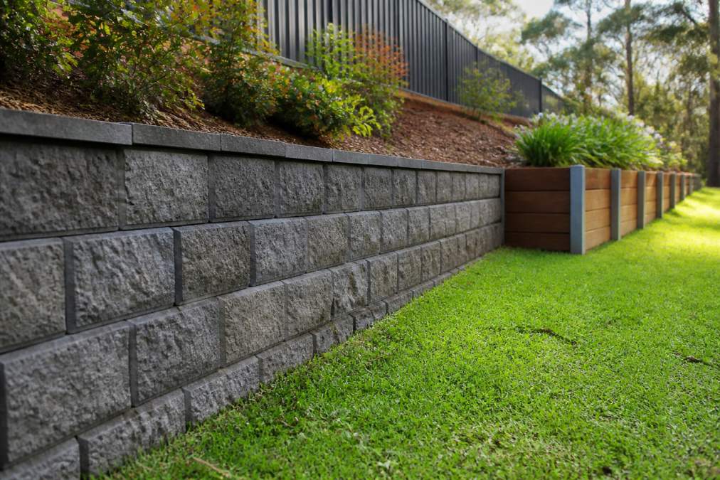 Retaining Walls vs Garden Beds for Sloped Backyards