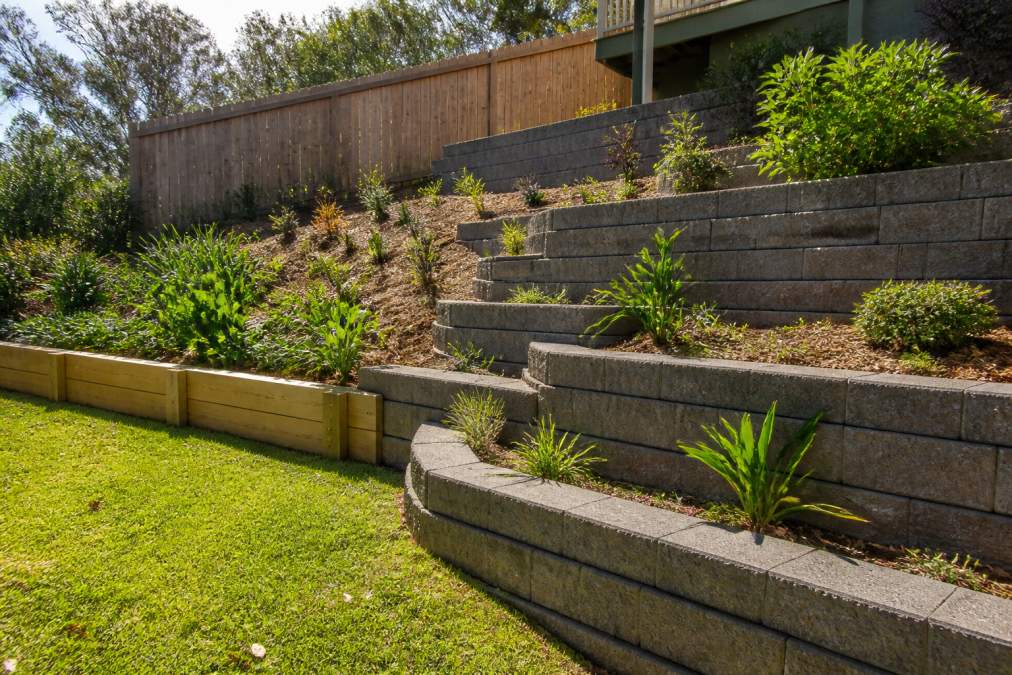 Visual comparison chart showing section and sloped and suburban concepts for retaining walls