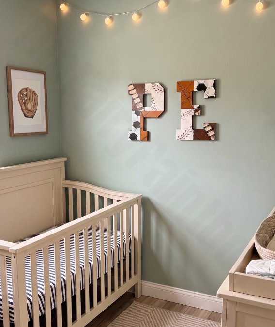 Vintage Sports painted wood letters hanging in a baseball sports nursery