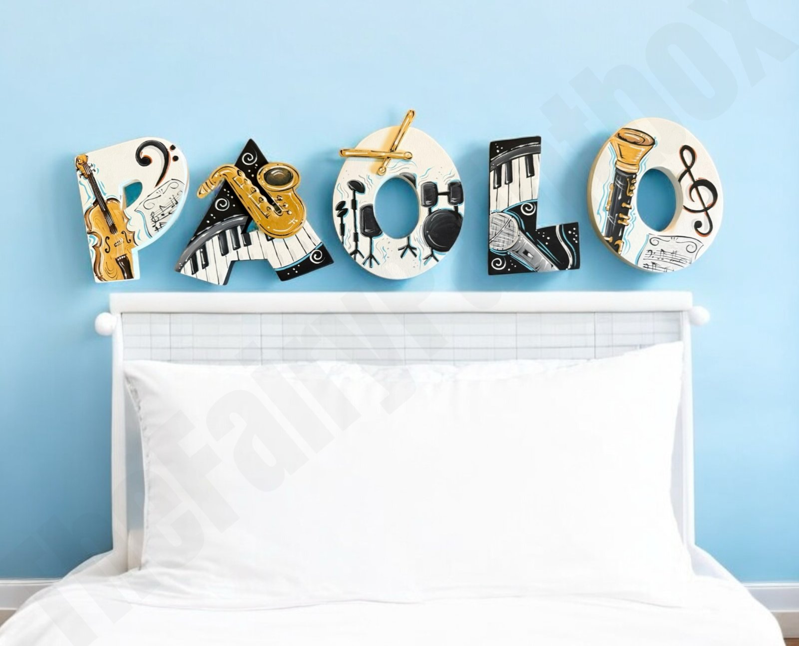 Musical instrument painted wood letters hang in child’s bedroom. Painted cello, piano, saxophone, drums, trumpet are painted on the letters.