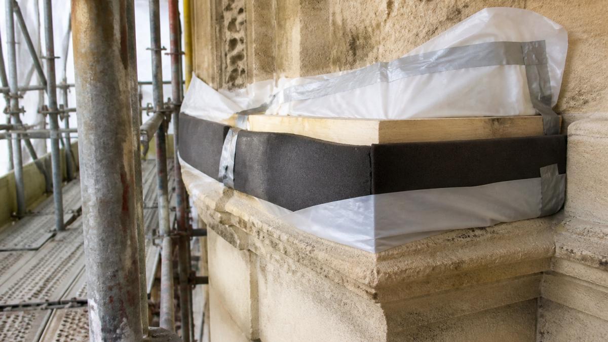 Diagram showing how a scaffolding company that erects own equipment protects historic masonry with buffers.