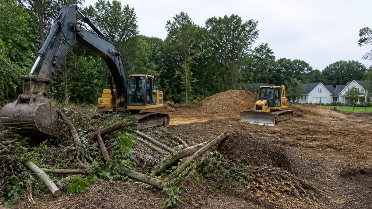 Infographic illustrating the site preparation checklist process for clearing land and grading residential lots.