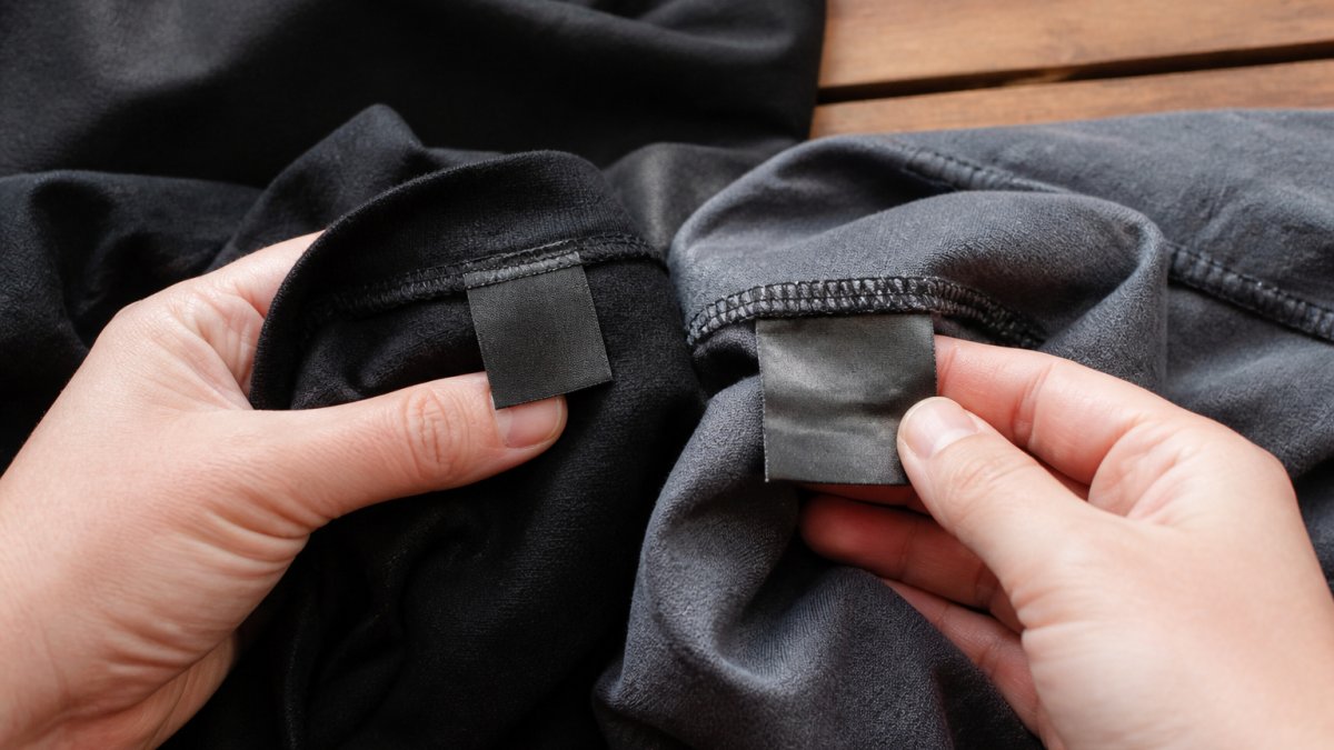 Infographic comparing garment construction, stitching, and tag details between two different clothing brands