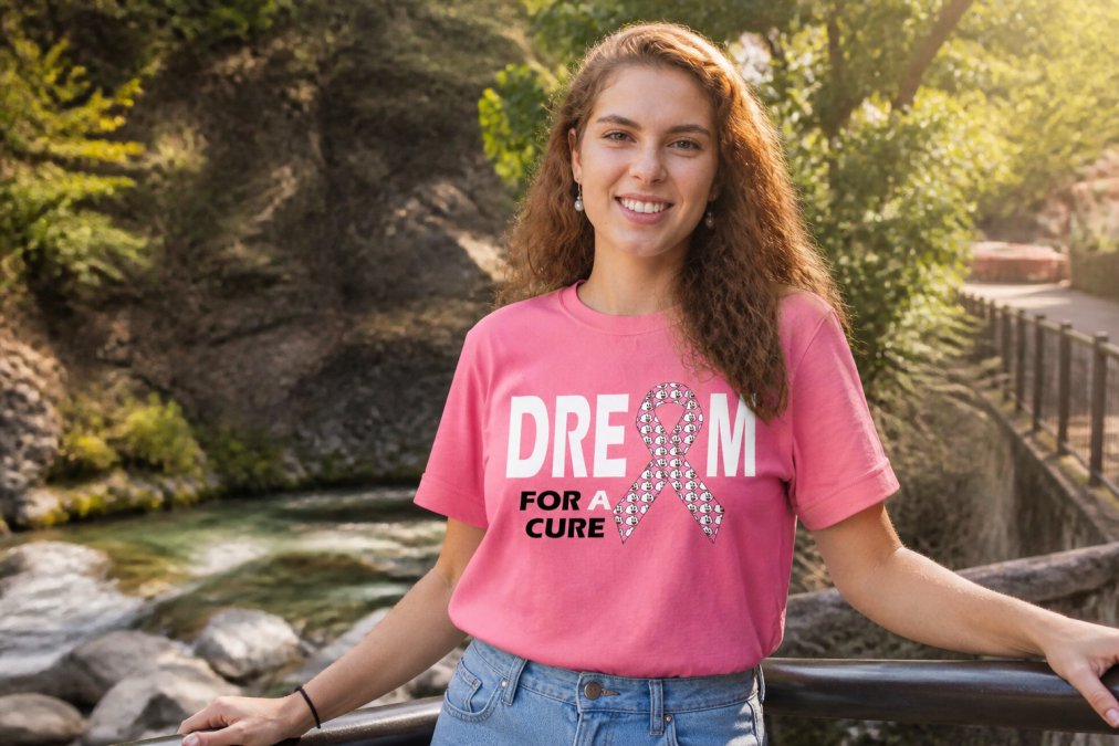 Person wearing cause-focused t-shirt with visible graphic design, natural lighting highlighting the fabric quality and print detail