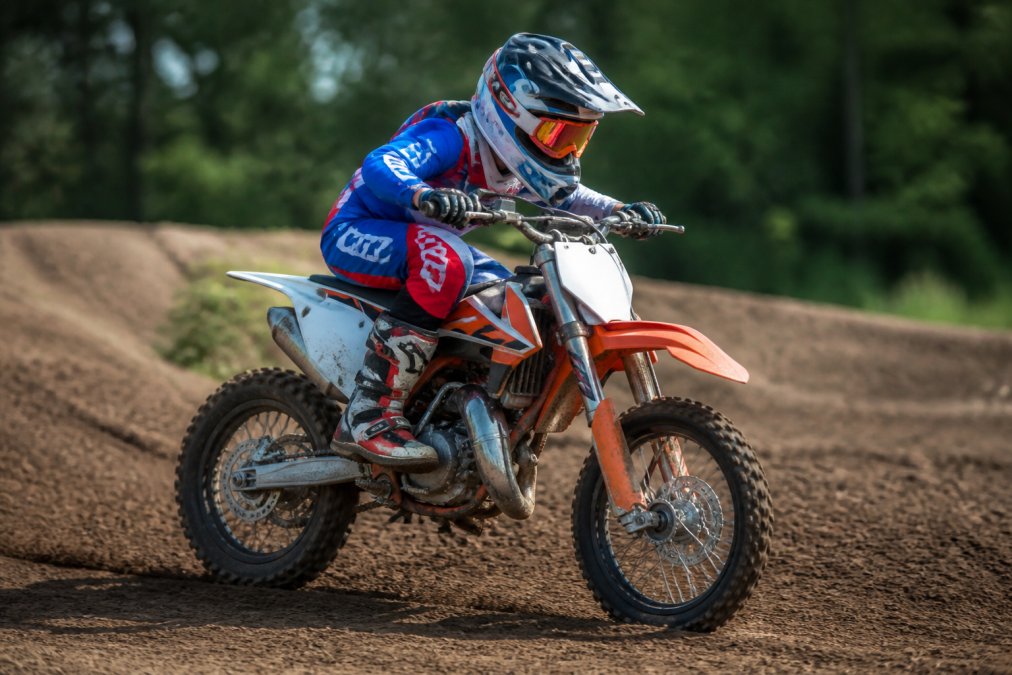 Professional illustration showing Young for young motocross riders
