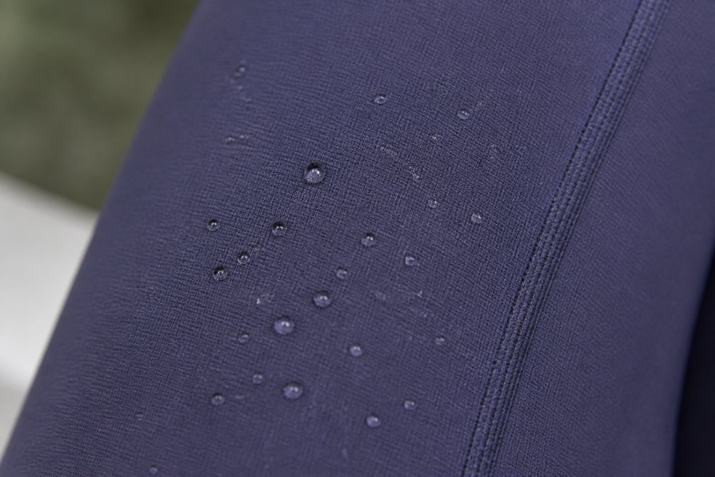 Infographic diagram illustrating moisture-wicking technology in breathable yoga leggings fabric structure
