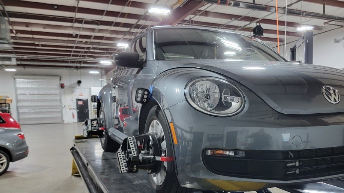 Volkswagen Beetle on the alignment rack at Eurocraft Automotive in Orlando