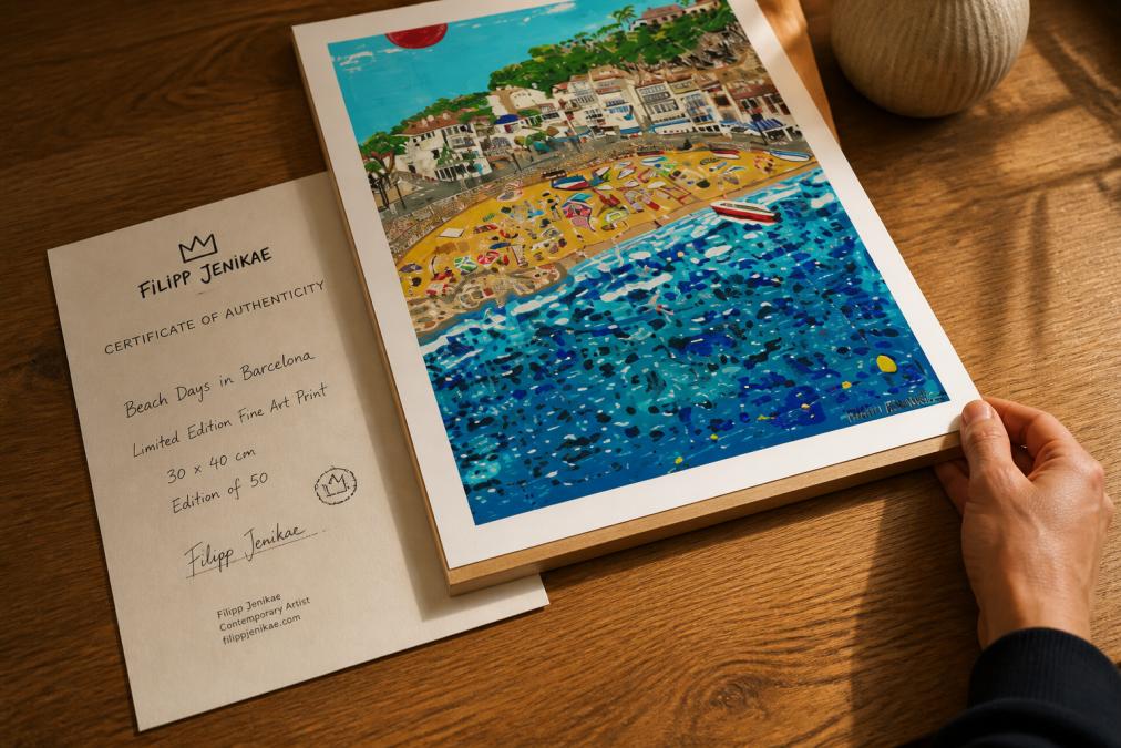 Close-up of a hand-signed fine art print resting on a wooden desk beside a handwritten certificate of authenticity, warm natural light, minimal styling