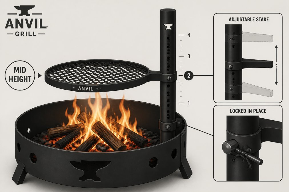Close-up of the ANVIL grill's carbon steel grate positioned at mid-height over an active campfire, showing the adjustable stake mechanism with the grate locked in place, flames visible beneath