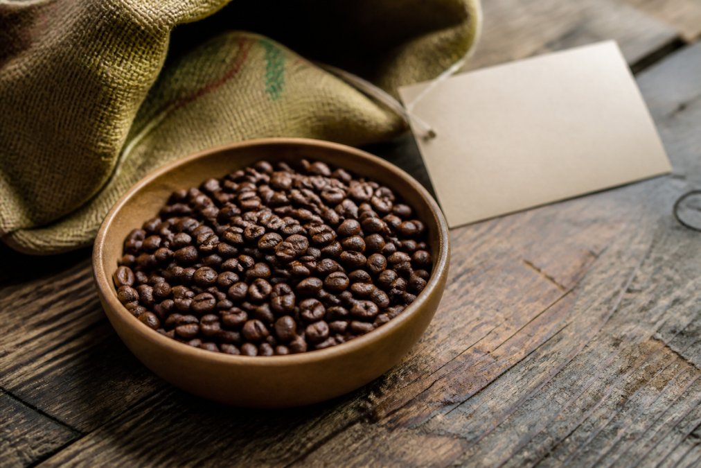 Infographic illustrating the selection process for small-batch specialty coffee beans from farm to roast