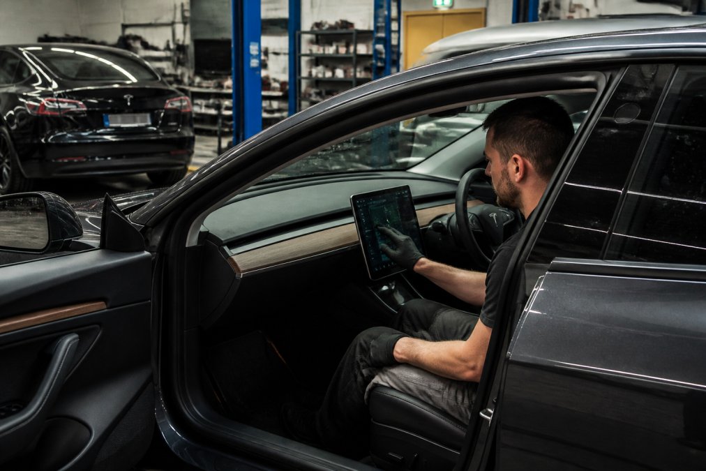Professional illustration showing Professional, Tesla for EV battery fails