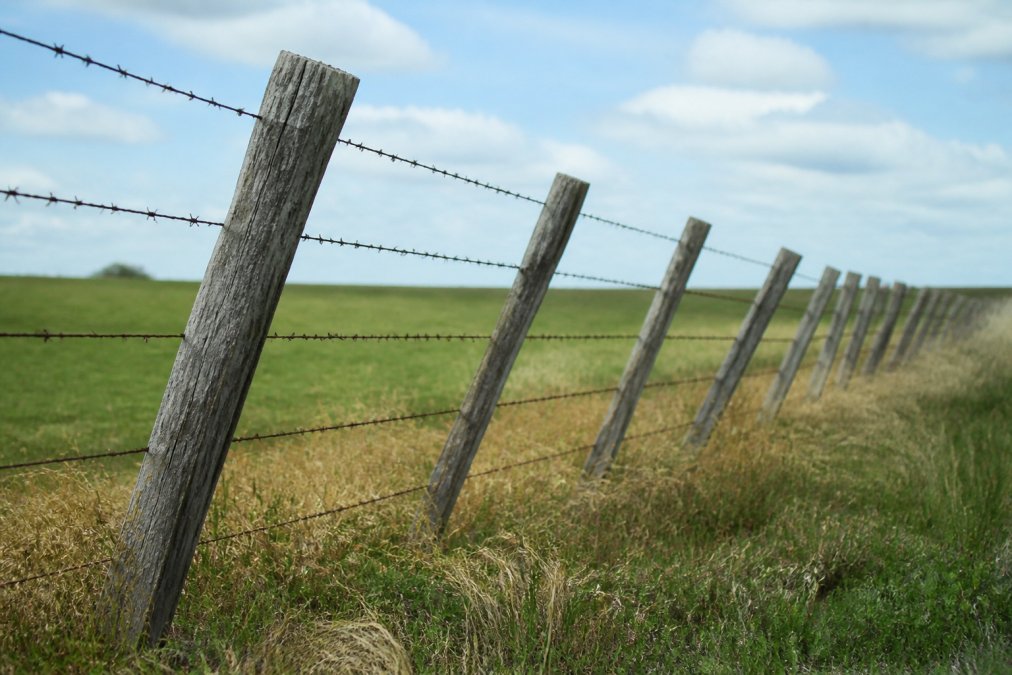 Why Fence Posts Lean Over Time: Causes and Fixes