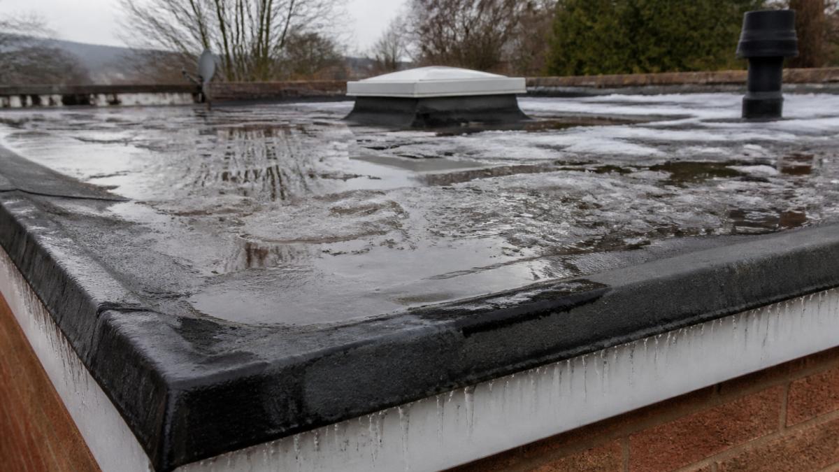 Why Flat Roofs Leak in Winter: A Complete Guide