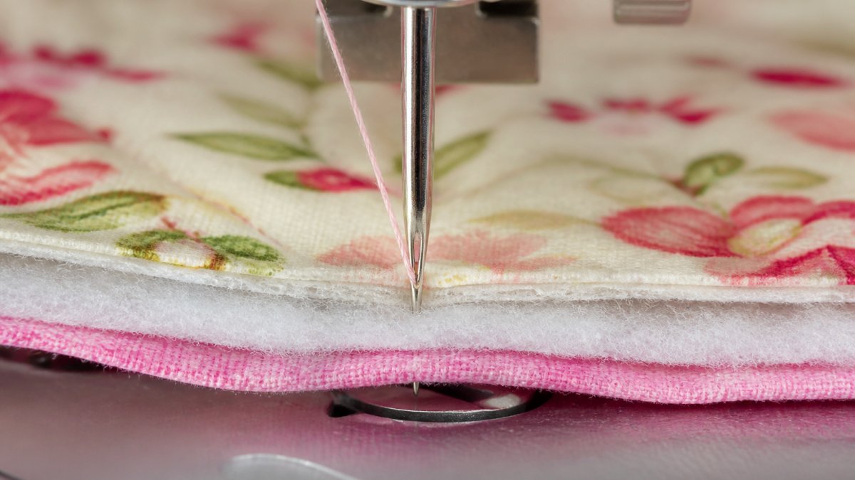 Photo illustrating Quilting Needle Size and Its Effect on Stitch Quality for specialized quilting needles