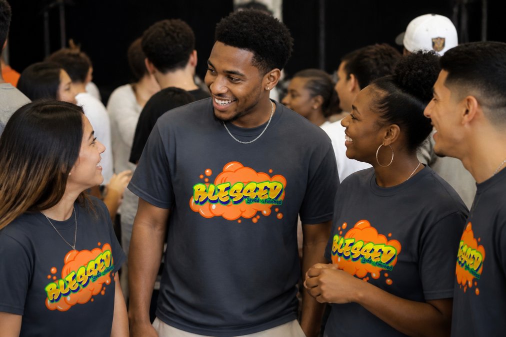 Diverse group of young adults wearing faith-inspired clothing gathered together at a community event or worship gathering, showing genuine connection and belonging with warm natural lighting